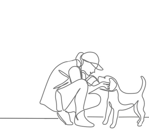 Ein junger Mensch lobt seinen Hund